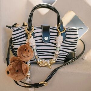 STONEY CLOVER LANE SAFARI POUCHETTE 01